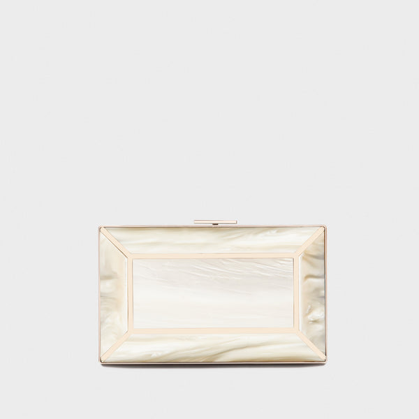 YLIANA YEPEZ Minaudiere. Rectangular clutch with gold frame and beige interior on a white background
