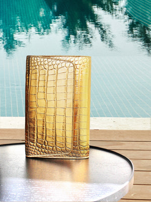 Gold crocodile-patterned clutch YY